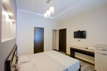 Двухместный номер Делюкс с 1 кроватью в Гостевом доме Center Hotel